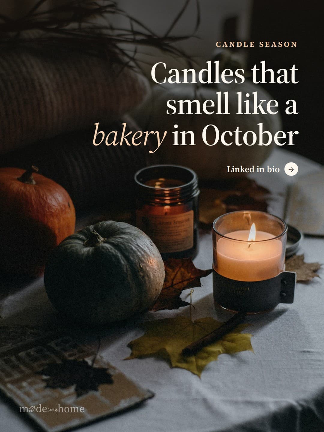 a table topped with a candle next to a p