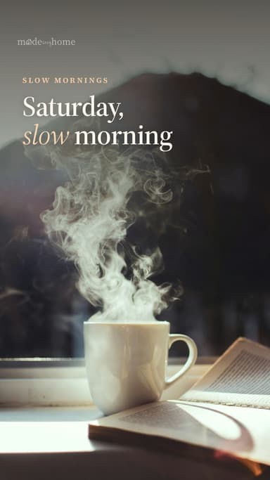 a cup of coffee and a book on a window s