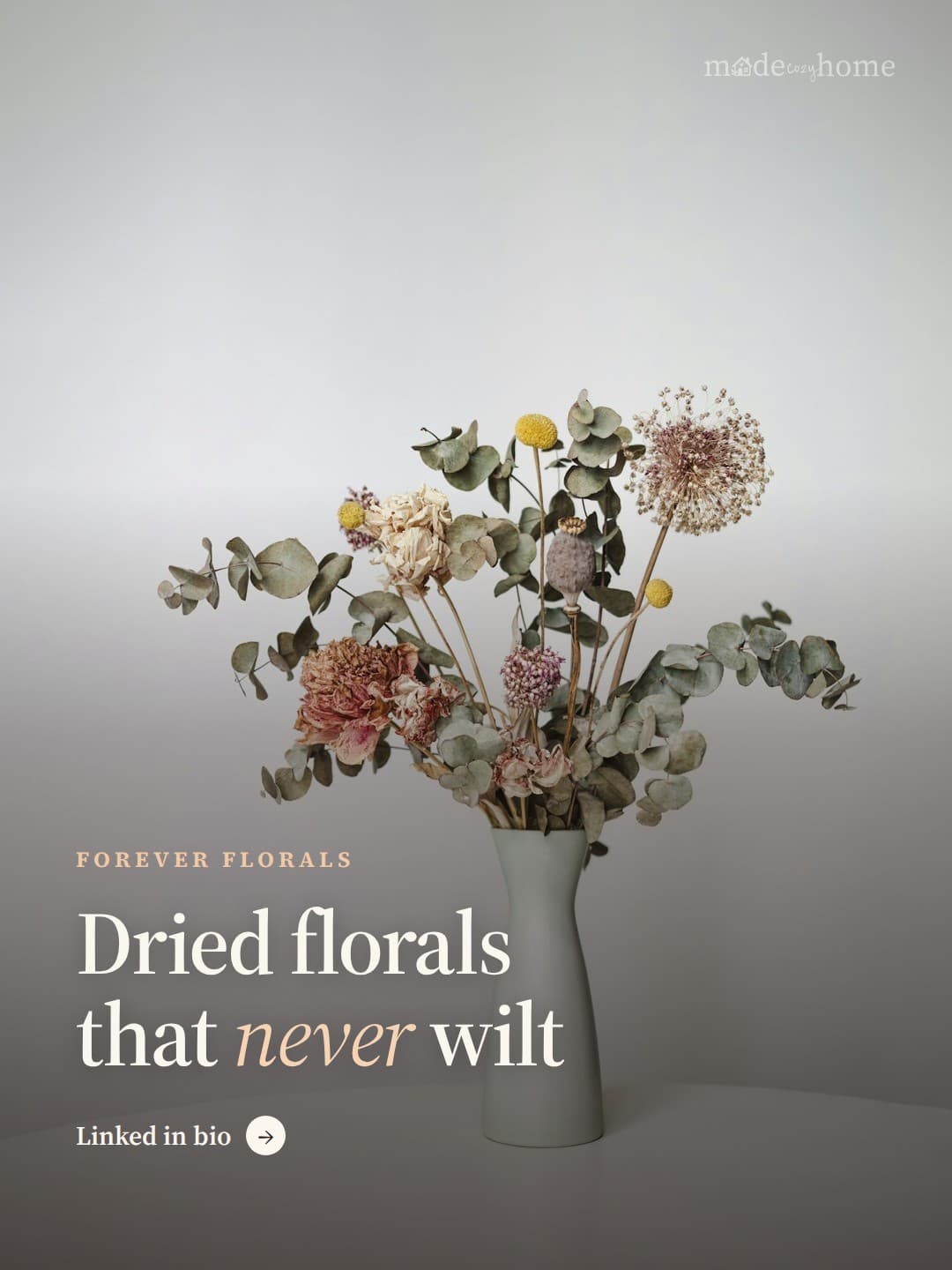 a vase filled with lots of flowers on to