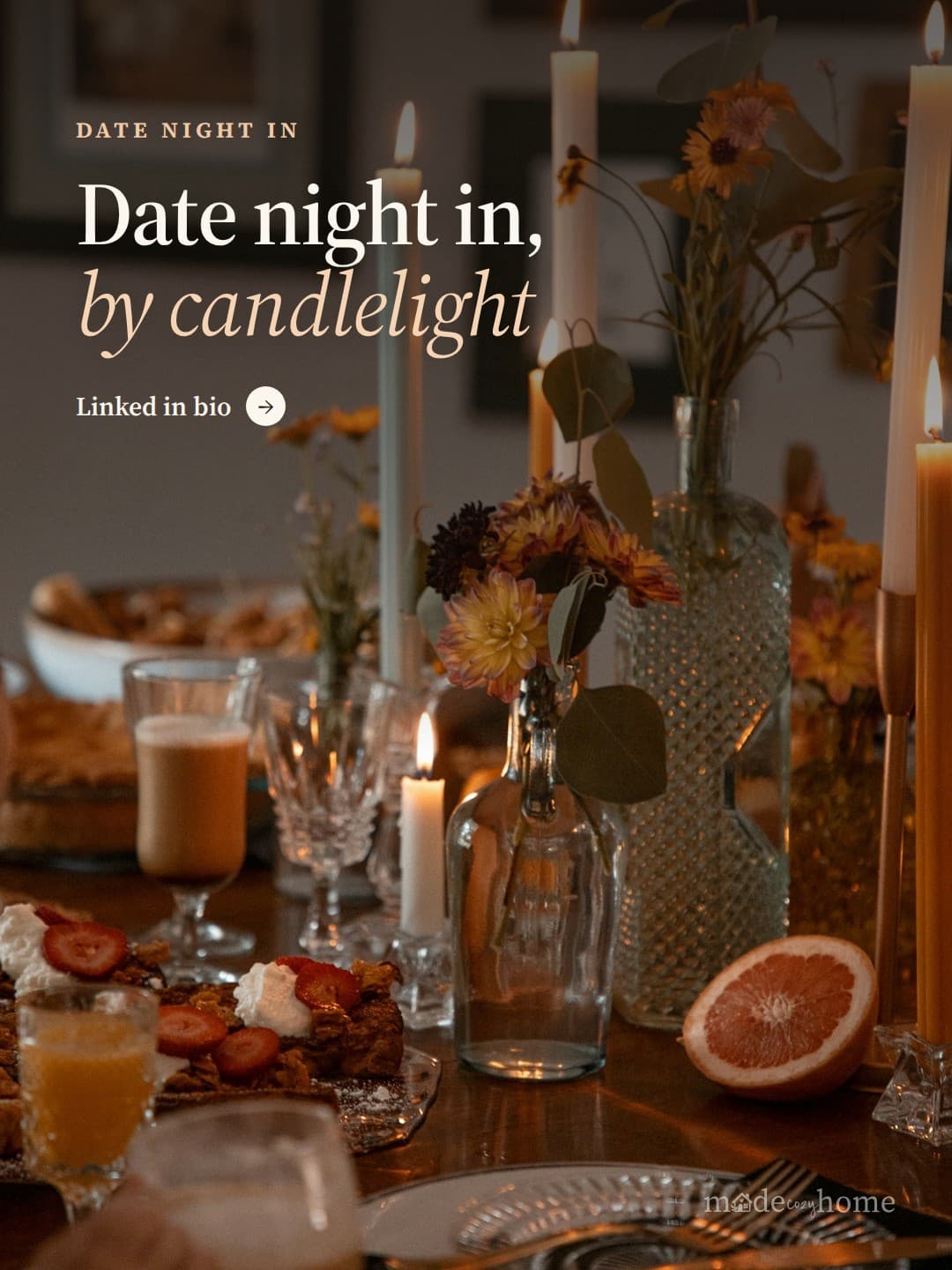 a table is set with candles and plates o