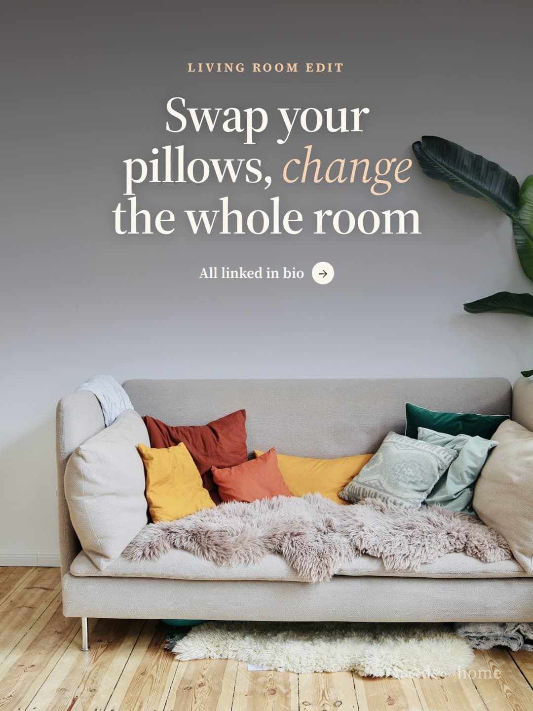 orange throw pillows on white couch