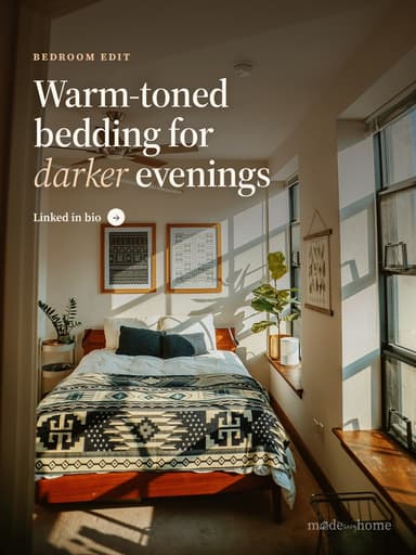 a bedroom with a bed and a ceiling fan