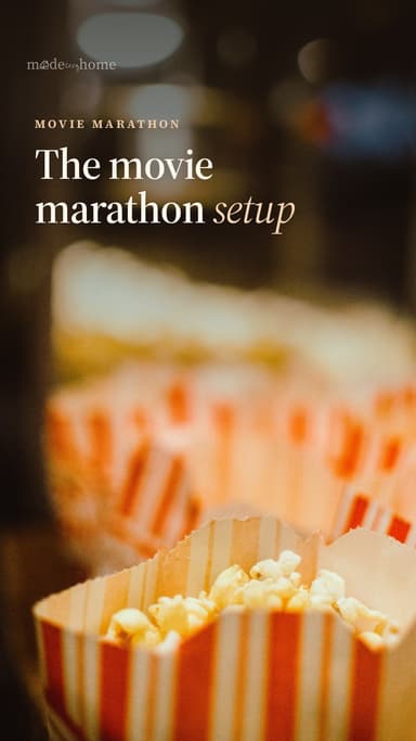 Popcorn in striped paper bags with a blu